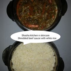 Shredded beef sauce with white rice A picture of Shredded beef sauce with white rice.