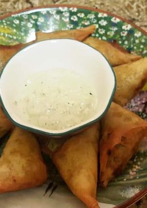 A picture of Paneer bhurji stuffed samosa.