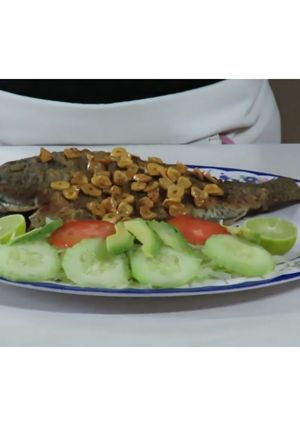 Una foto de Mojarra al ajillo