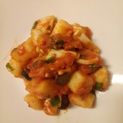 A picture of Seppie e patate squid and potatoes.