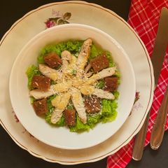 A picture of Grilled Chicken Caesar salad.