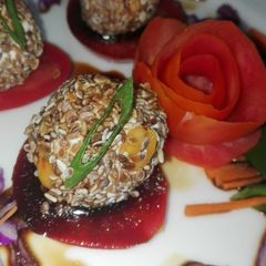 A picture of Sesame Peanut & hangcurd balls with soya honey dressing.