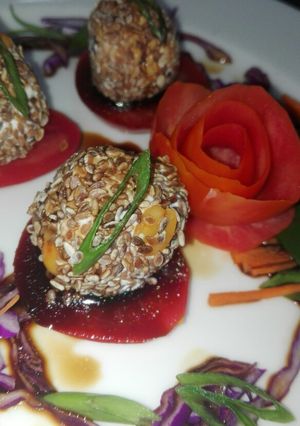 A picture of Sesame Peanut & hangcurd balls with soya honey dressing.