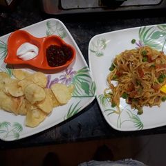 Butter fry maggi with veggies A picture of Butter fry maggi with veggies.