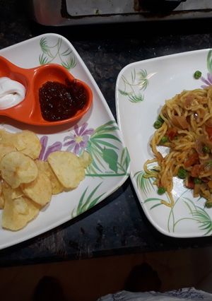 A picture of Butter fry maggi with veggies.