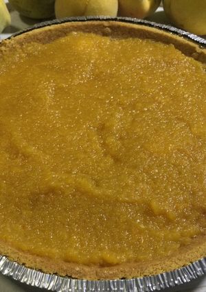 Una foto de Pie de queso con durazno