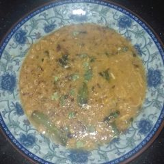 A picture of Daal Chaana and Shredded Chicken.