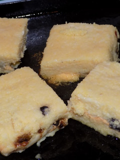 Una foto de Polenta napolitana rellena grillada