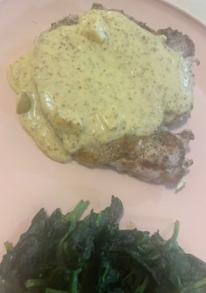 A picture of Pork chop with Mustard sauce.