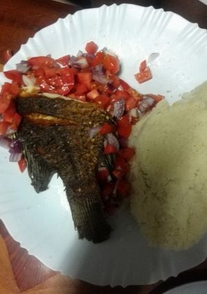 A picture of Fried fish with kachumbari.