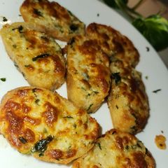 A picture of Cheesy herb garlic bread.