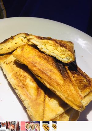 A picture of Egg filled toasted bread.