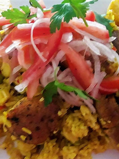 Una foto de Arroz con Solomillo - Chancho a lo Carmelita