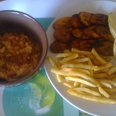 A picture of Fried Plantain/Irish potatoes with Scrambled Egg sauce.