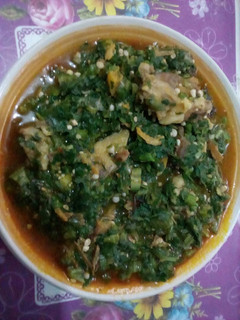 A picture of Ugbogulu and okro soup.