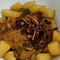 A picture of Chicken jumping over the wall.