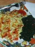 French fries with freid pumpkin leaves (kahurura)