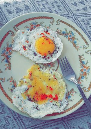 A picture of Poached eggs/ Half fry eggs.