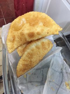 Una foto de Empanadas de pollo fritas