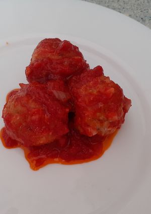 Foto di Polpette di pane e prosciutto al sugo