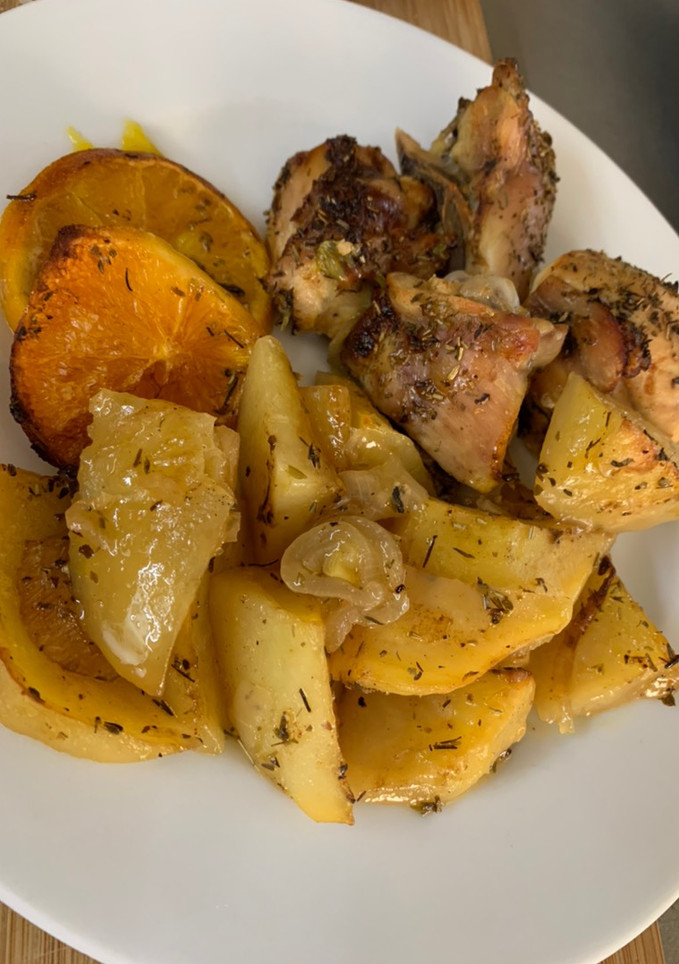 Una foto de Pollo al horno con naranja