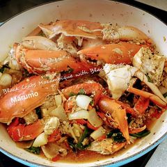 A picture of Stir fry Black Crabs Mozambique with Black pepper.