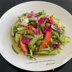 Thai Style Cucumber Salad With Edible Flowers A picture of Thai Style Cucumber Salad With Edible Flowers.