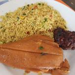 Jollof Rice and Chicken with Coleslaw - Travelandmunchies