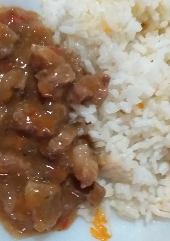 Una foto de Arroz con carne al jugo