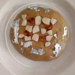 A picture of 5 minutes flat sattu laddu.