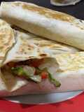 Shawarma de pollo y cebolla caramelizada