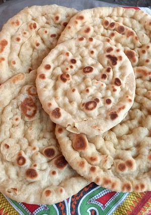 A picture of Homemade naan, without oven.