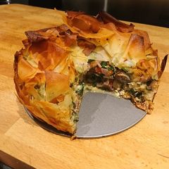 A picture of Spinach, feta, mushroom and filo pie.