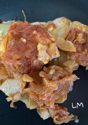 Una foto de Bacalao al estilo portugues