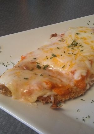 Una foto de Pollo parmesano