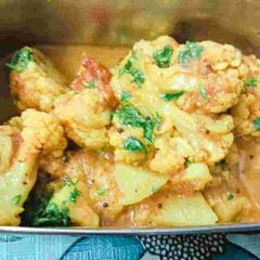 A picture of Cauliflower, potato gravy masala vegetable.