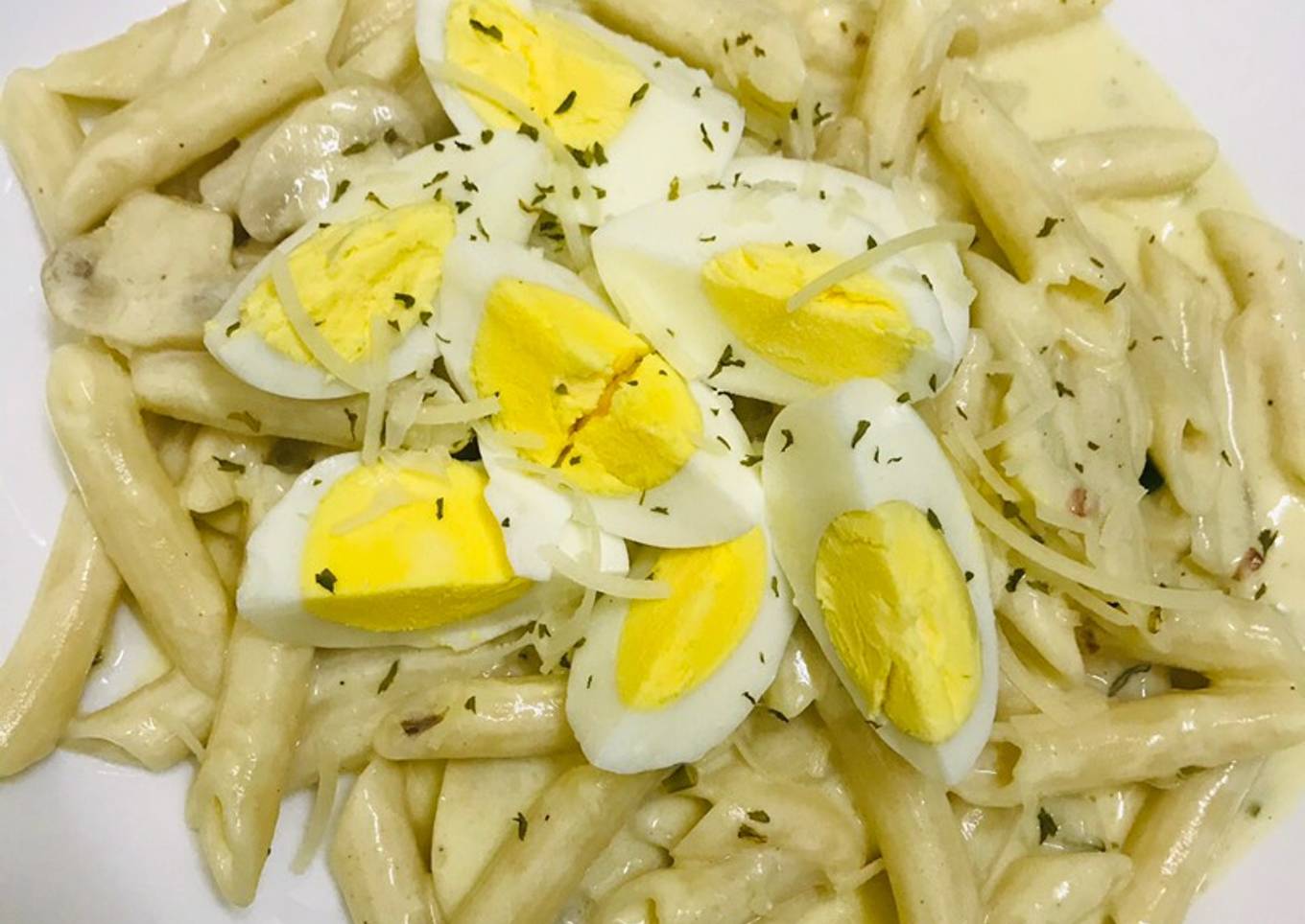 Low gluten spicy pasta with Lemon garlic, mushroom top with egg and Parmesan cheese 😉🥒🍋🧄🥚🌶
