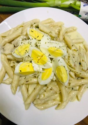 A picture of Low gluten spicy pasta with Lemon garlic, mushroom top with egg and Parmesan cheese 😉🥒🍋🧄🥚🌶.