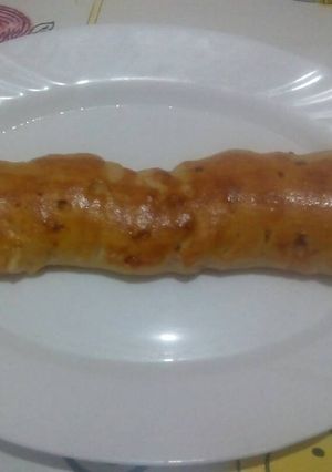 Foto principal de Barra rellena de jamón y beicon con masa de pizza con orégano 
