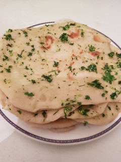 A picture of Homemade Garlic Parsley Naan Bread.