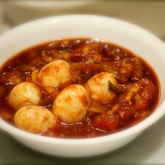 A picture of Quail Eggs In Red Chilli Sauce.