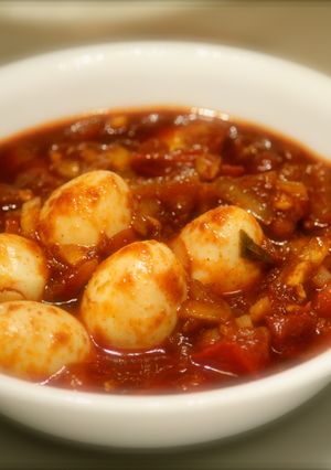 A picture of Quail Eggs In Red Chilli Sauce.