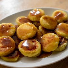A picture of Potato Mochi with sweet soy sauce.
