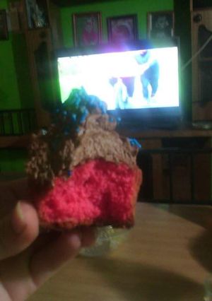 Una foto de Cupcakes de color y crema chantilly de chocolate 