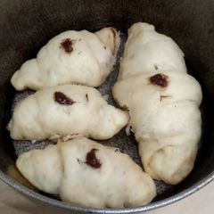 A picture of Crossiant with chocolate spread 🥐🥐🍫.