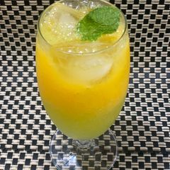 A picture of Tropical drink with tropical fruits.