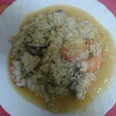 Una foto de Arroz caldoso con frutos del mar