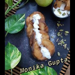 A picture of California apple rings with traditional Indian sweet rabri dip.