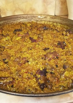 A picture of Paella with Pork Ribs and Cauliflower.