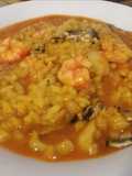 Arroz meloso de sepia, cocochas de merluza y gamba roja